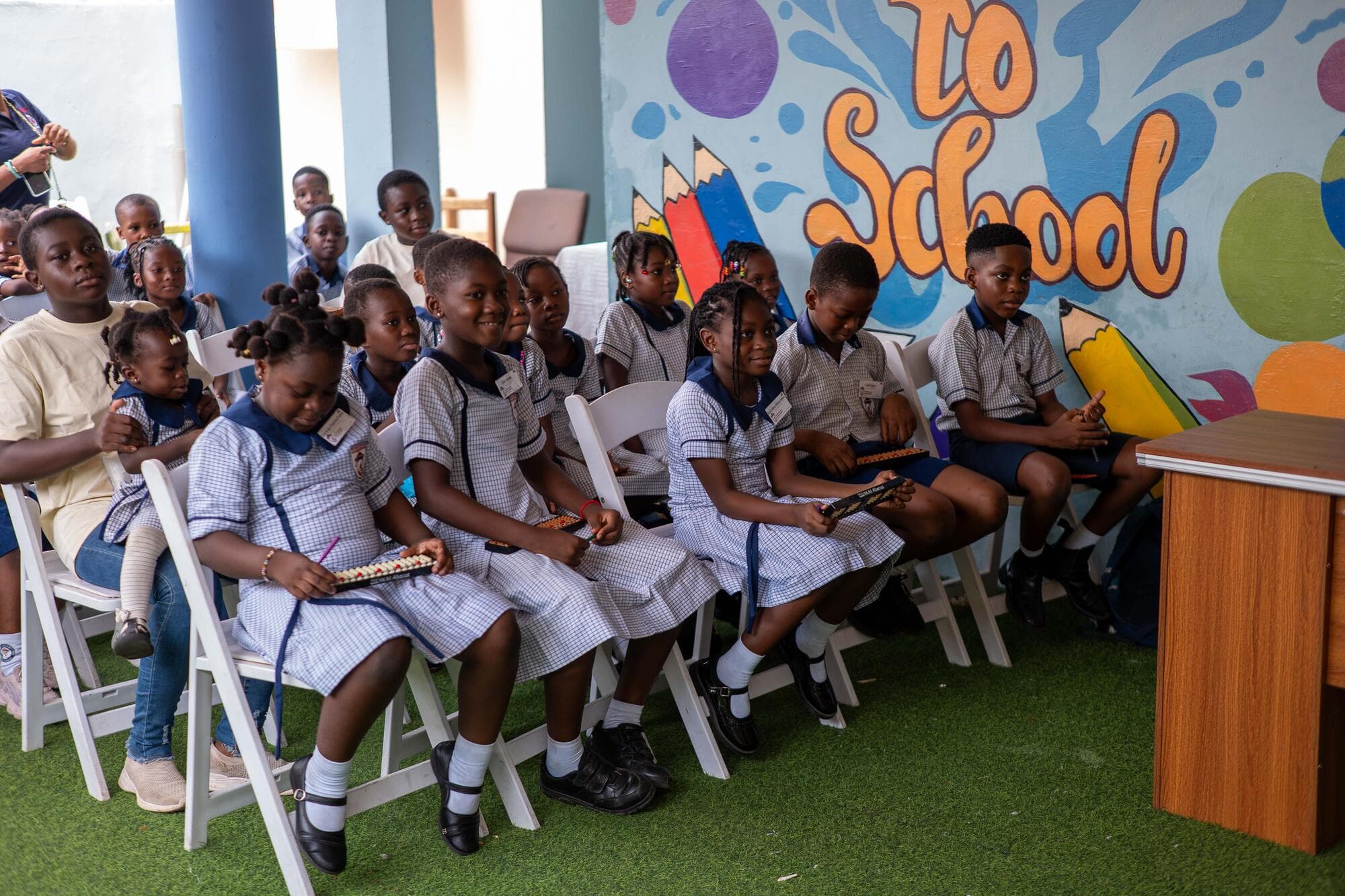 Graceland pupils seated with abacus tools during the opening assembly
