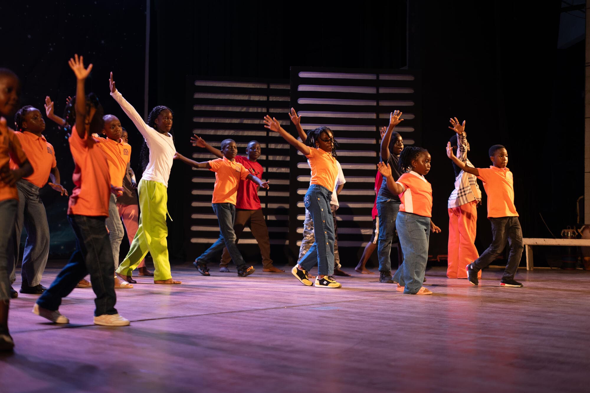 Graceland pupils rehearsing a dance routine on the National Theatre stage